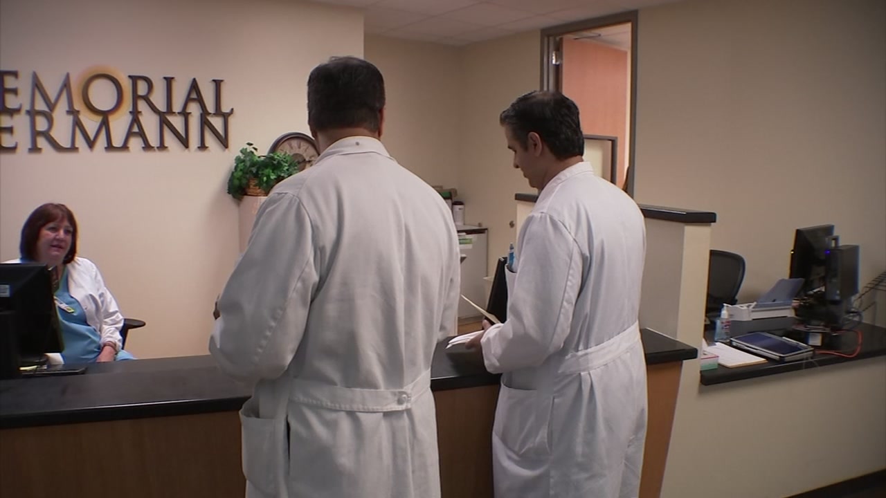 Father's illness inspires twins to become doctors